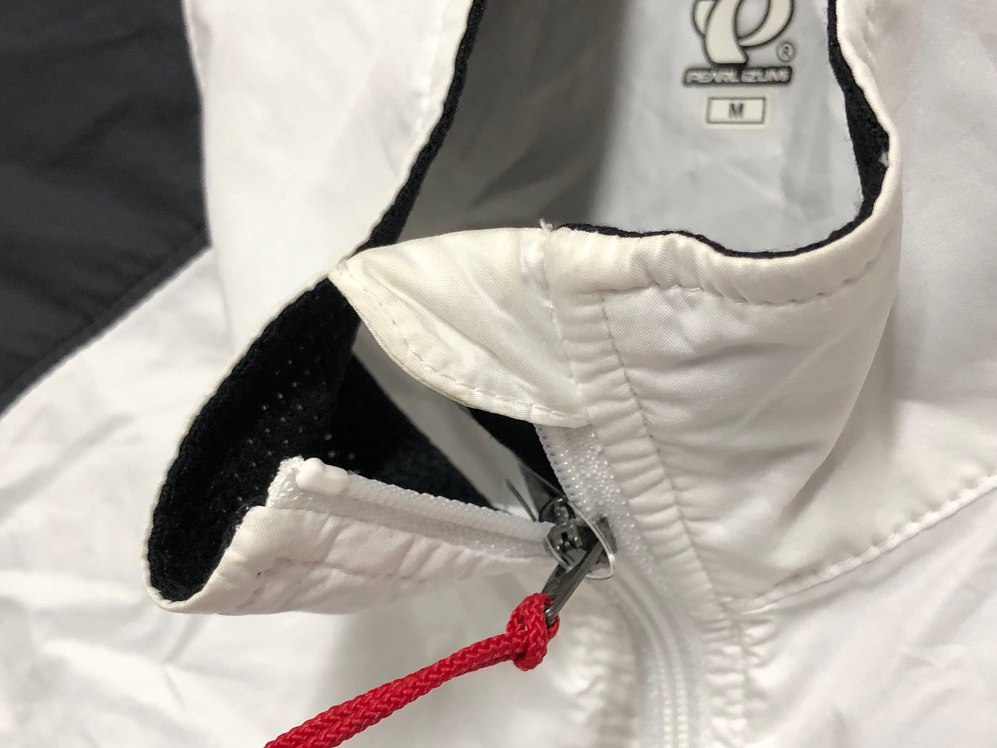 IZ767 パールイズミ PEARL iZUMi 長袖 ウィンドブレーカー 白 黒 M