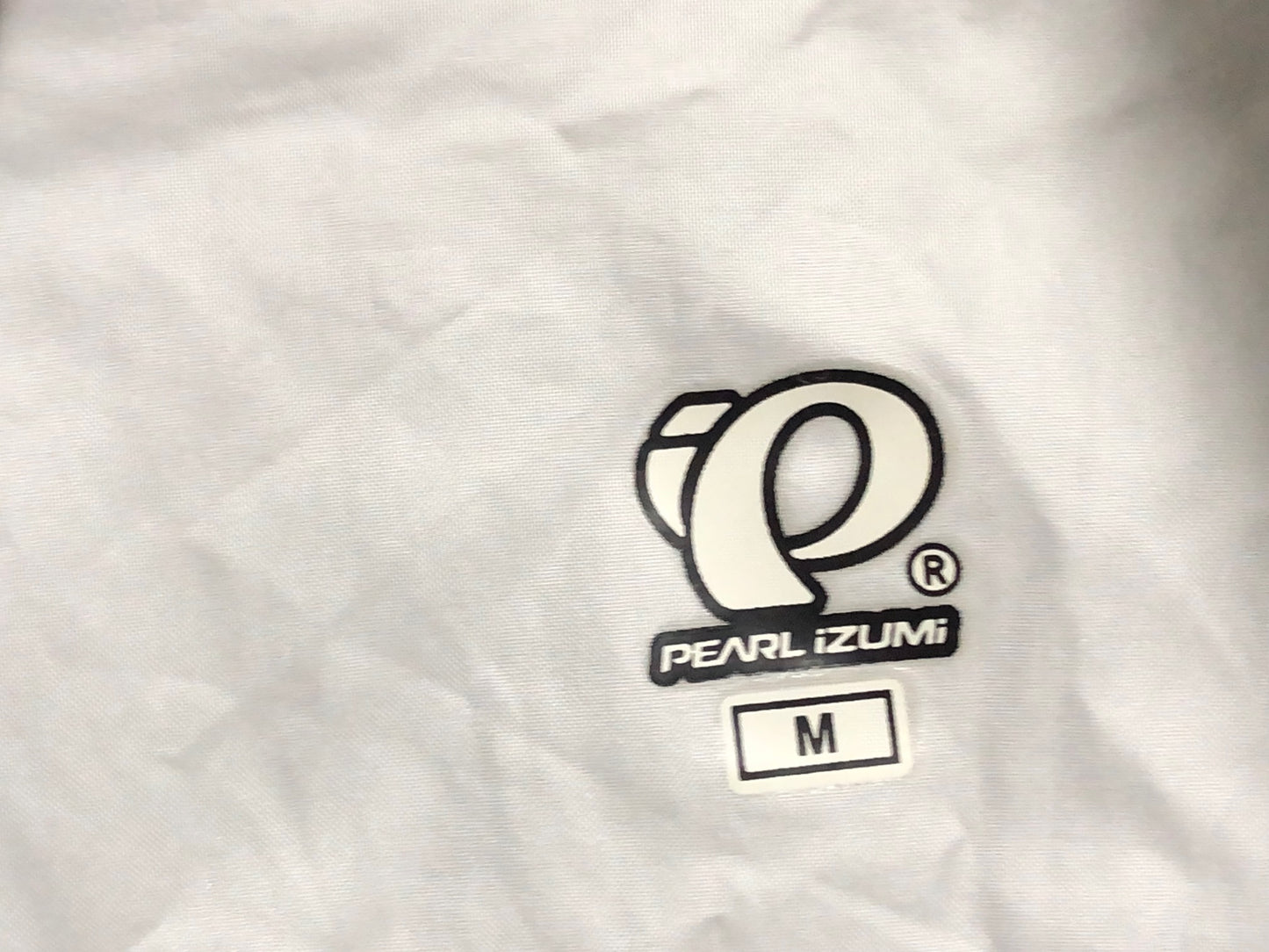 IZ767 パールイズミ PEARL iZUMi 長袖 ウィンドブレーカー 白 黒 M