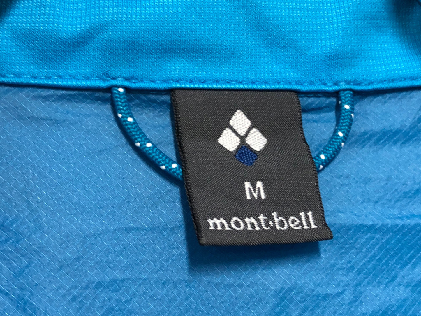 IK497 モンベル mont-bell 長袖 ウィンドブレイカー 青 M