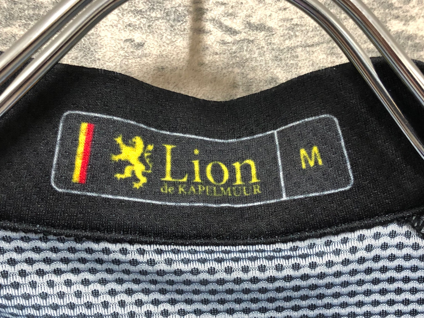 IZ773 リオンドカペルミュール Lion de KAPELMUUR 半袖 サイクルジャージ 黒 紺 M ※一部穴