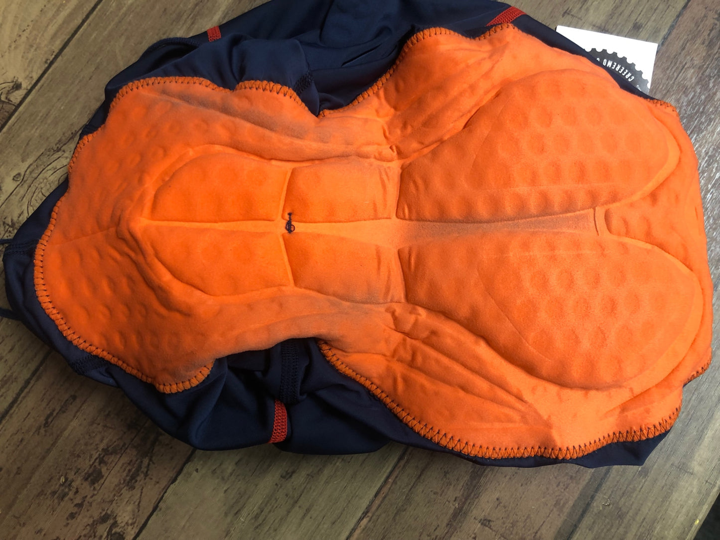 IO084 ルコックスポルティフ le coq sportif レーサーパンツ 紺 赤 O ※擦れ