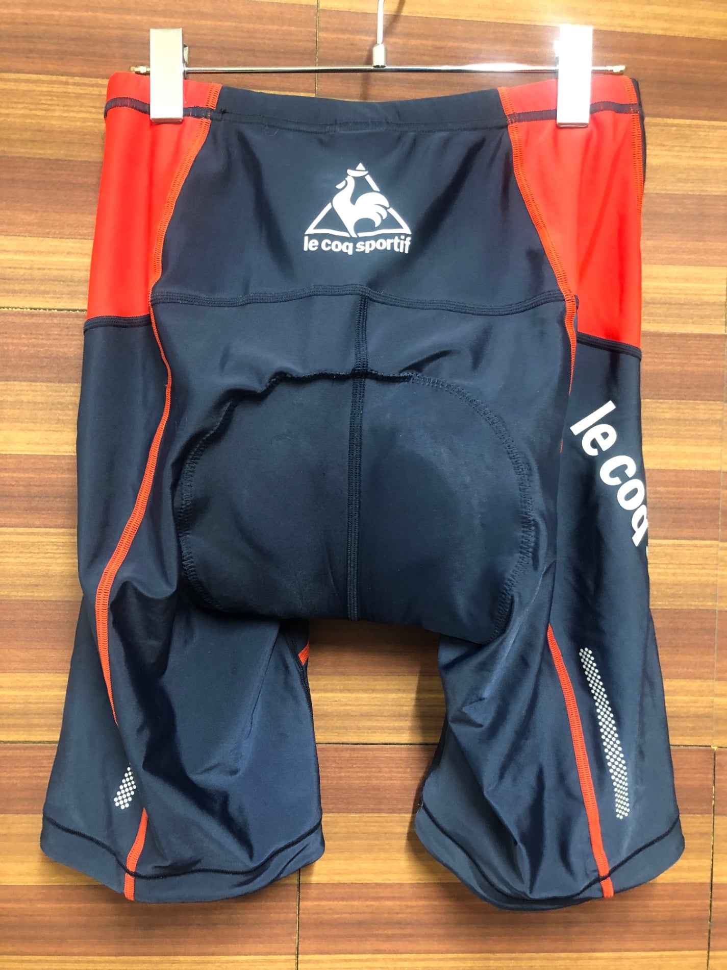 IO084 ルコックスポルティフ le coq sportif レーサーパンツ 紺 赤 O ※擦れ
